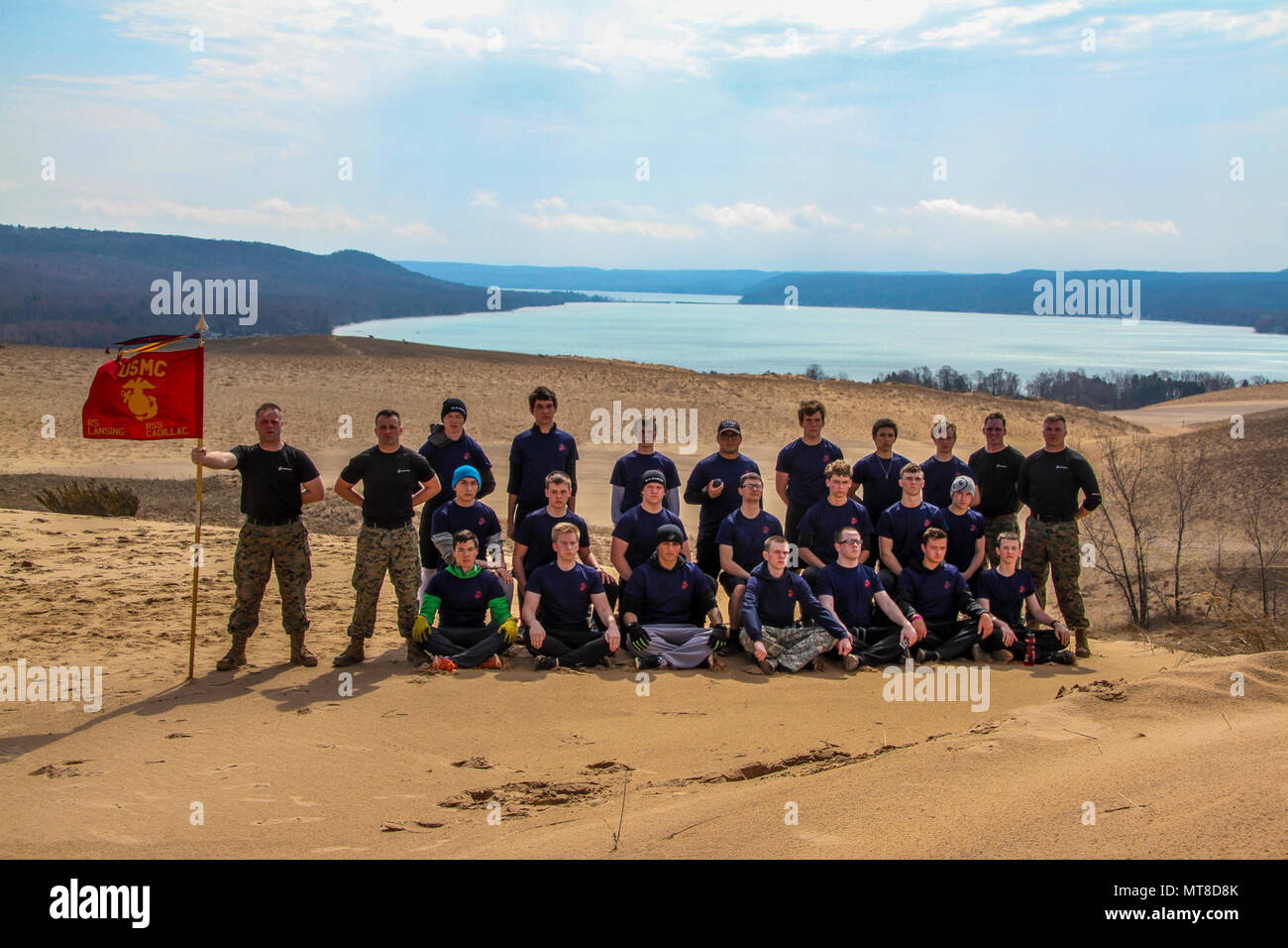Future Marines pose for a photo with Marine Corps recruiters from