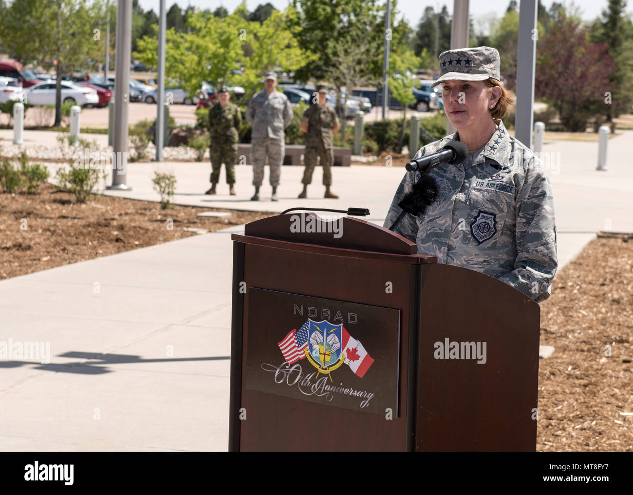 U.S. Air Force General Lori Robinson, Commander of the North American Aerospace Defense Command and U.S. Northern Command speaks during the unveiling ceremony for a memorial cairn outside the NORAD and USNORTHCOM headquarters building on Peterson Air Force Base, Colorado, May 11. The cairn honors the Canadian service men and women who passed away while serving at NORAD in Colorado Springs. The placement and dedication of the cairn was conducted in conjunction with the 60th Anniversary of NORAD and the U.S. Canadian binational NORAD agreement. (DoD Photo By N&NC Public Affairs) Stock Photo