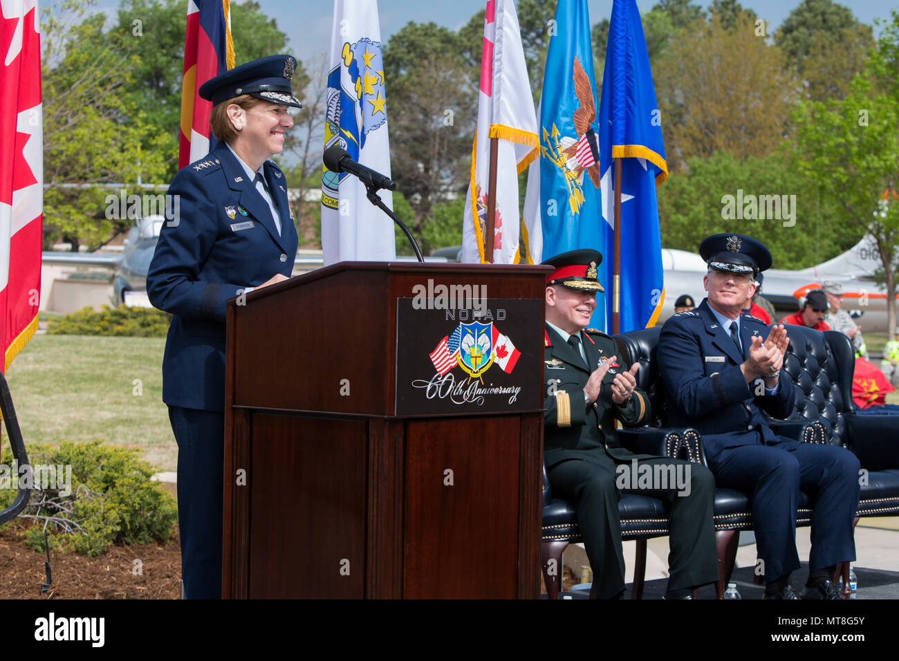U.S. Air Force General Lori Robinson, Commander of the North American Aerospace Defense Command and U.S. Northern Command speaks during the NORAD 60th Anniversary Ceremony on Peterson Air Force Base Colorado, May 12. The ceremony and static display of various NORAD aircraft was the culmination of a three-day event, which included a media tour of Cheyenne Mountain Air Force Station, the dedication of a cairn outside the commands’ headquarters building memorializing the Canadians who have passed away while serving NORAD, and a fly over in missing-man formation performed by the Royal Canadian Air Stock Photo