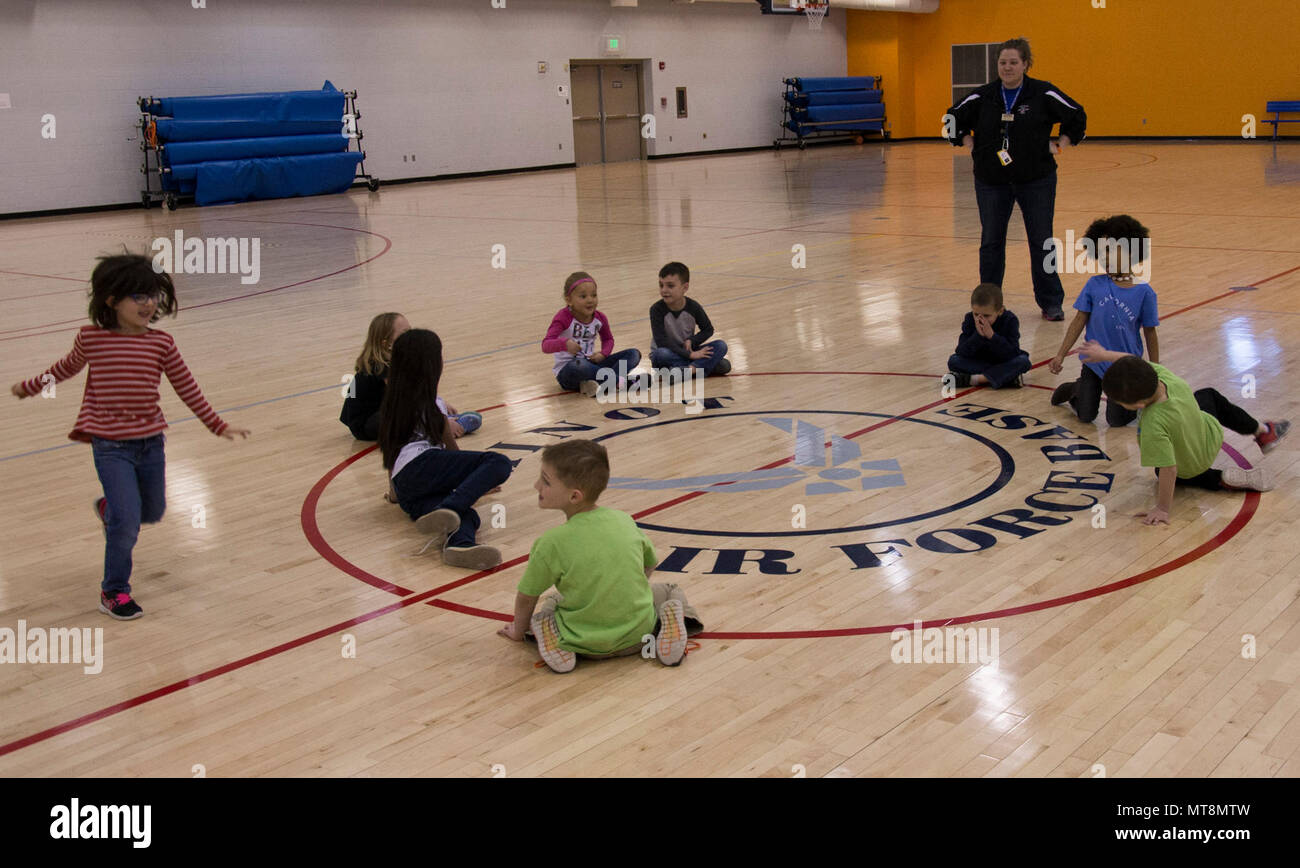 Youth Center children play duck duck goose during an event at the McAdoo  Fitness Center at Minot Air Force Base, N.D., April 17, 2017. This group of  kindergarteners and first-graders participated in