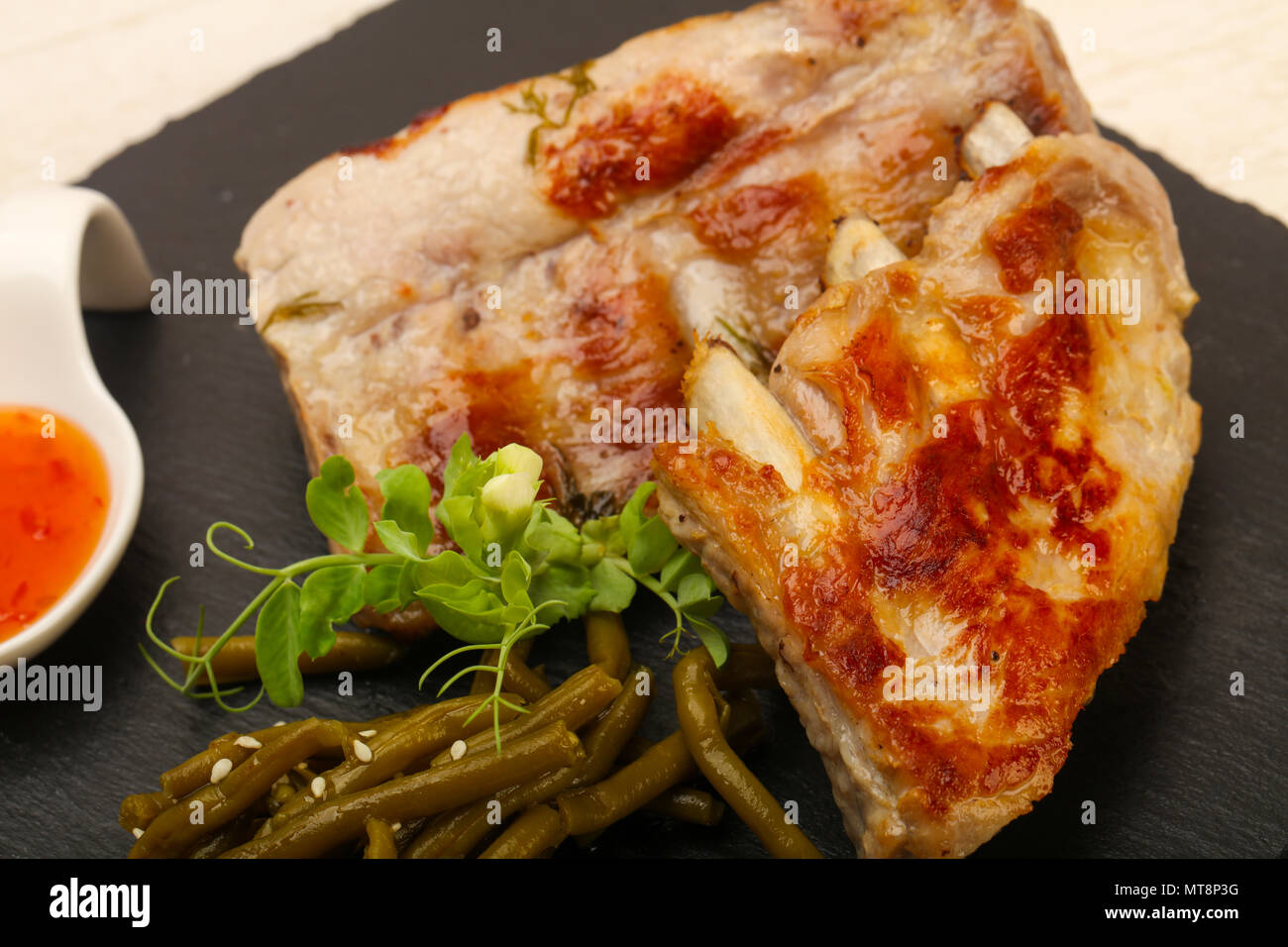 Roasted pork spare ribs Stock Photo Alamy