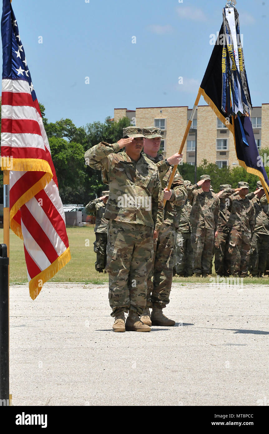 The 1st Battalion, 141st Infantry Regiment of the 72nd Infantry Brigade Combat Team, 36th Infantry Division, Texas Army National Guard held a deployment ceremony on April 16, 2018 at Joint Base San Antonio - Fort Sam Houston, Texas.  Task Force Alamo is set to deploy to the Horn of Africa to take over duties from their Texas sister, the 3rd Battalion, 144th Infantry Regiment of the 56th IBCT.  Friends and family said farewell for the unit set to deploy later this month.  (Texas Army National Guard photo by Master Sgt. Michael Leslie, 36th Infantry Division Public Affairs) Stock Photo