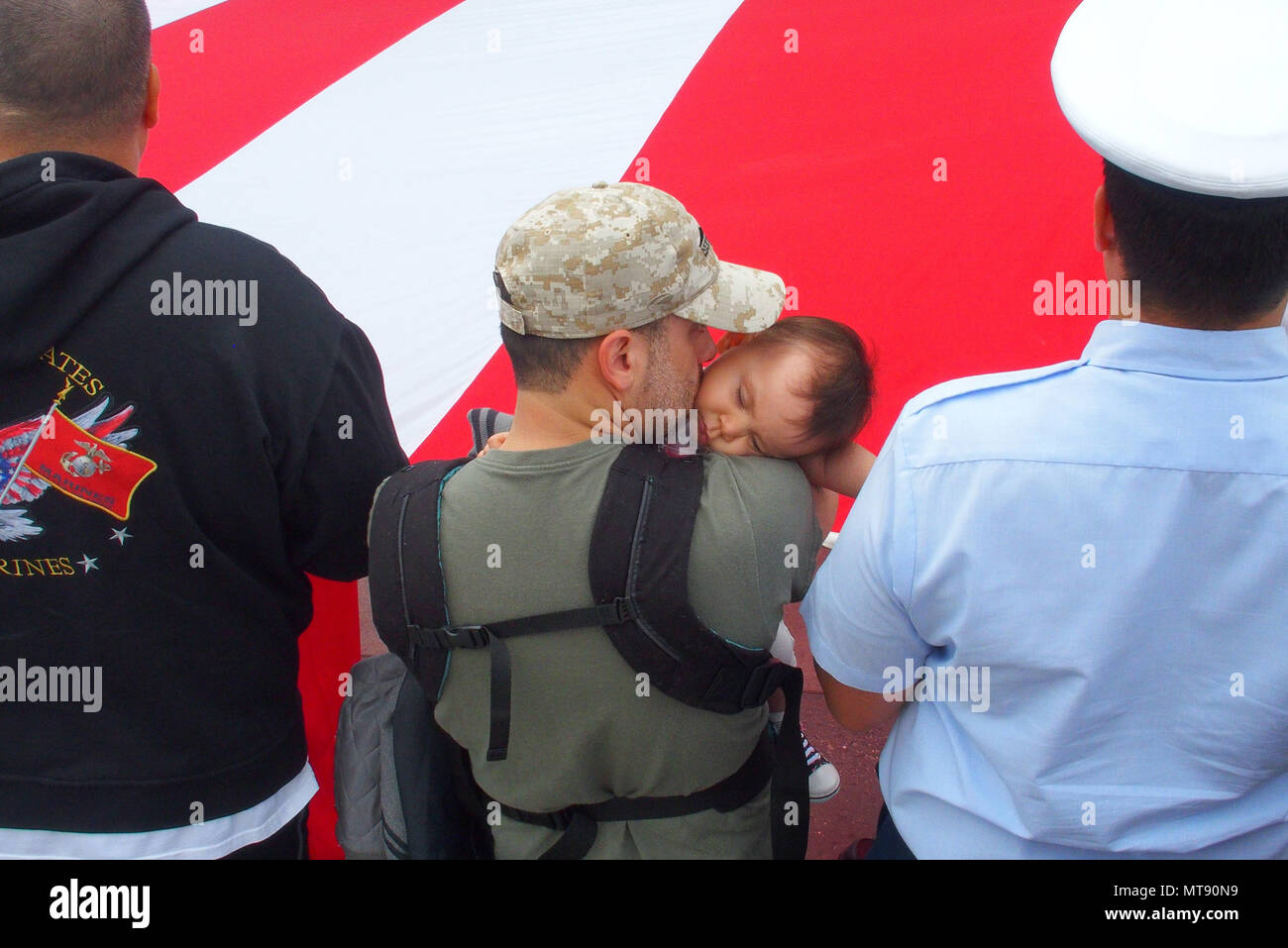 May 28, 2018 - New York, New York, U.S. - Memorial Day Ceremony on Intrepid Sea,Air & Space Museum in New York City.  Veteran Carlos Jimenez with Daughter Livia who is 10 months old (Credit Image: © Bruce Cotler/Globe Photos via ZUMA Wire) Stock Photo