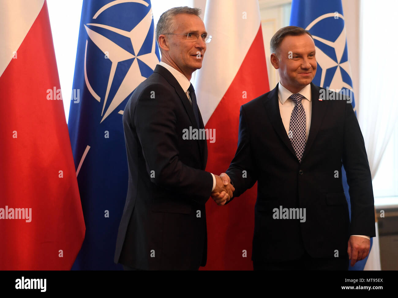 Warsaw, Poland. 28th May, 2018. Polish President Andrzej Duda (R) shakes hands with NATO Secretary General Jens Stoltenberg at Belweder Palace in Warsaw, Poland, on May 28, 2018. Credit: Maciej Gillert/Xinhua/Alamy Live News Stock Photo