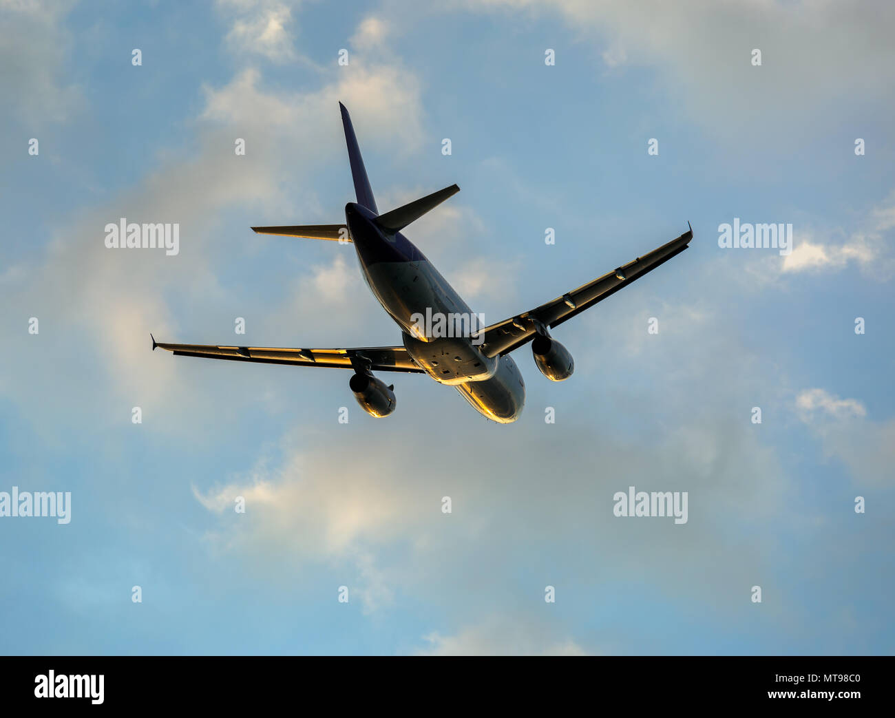 Airplane in clouds hi-res stock photography and images - Alamy