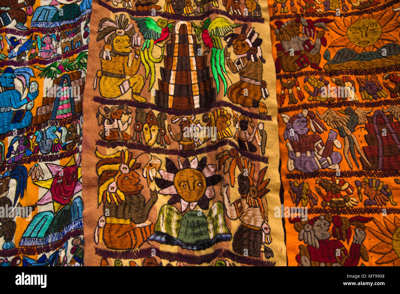 Ciudad de Guatemala, Guatemala, April, 25, 2018: Typical brightly colored handwoven Guatemalan textiles for sale by local indigenous people at an open air street market in Antigua Stock Photo
