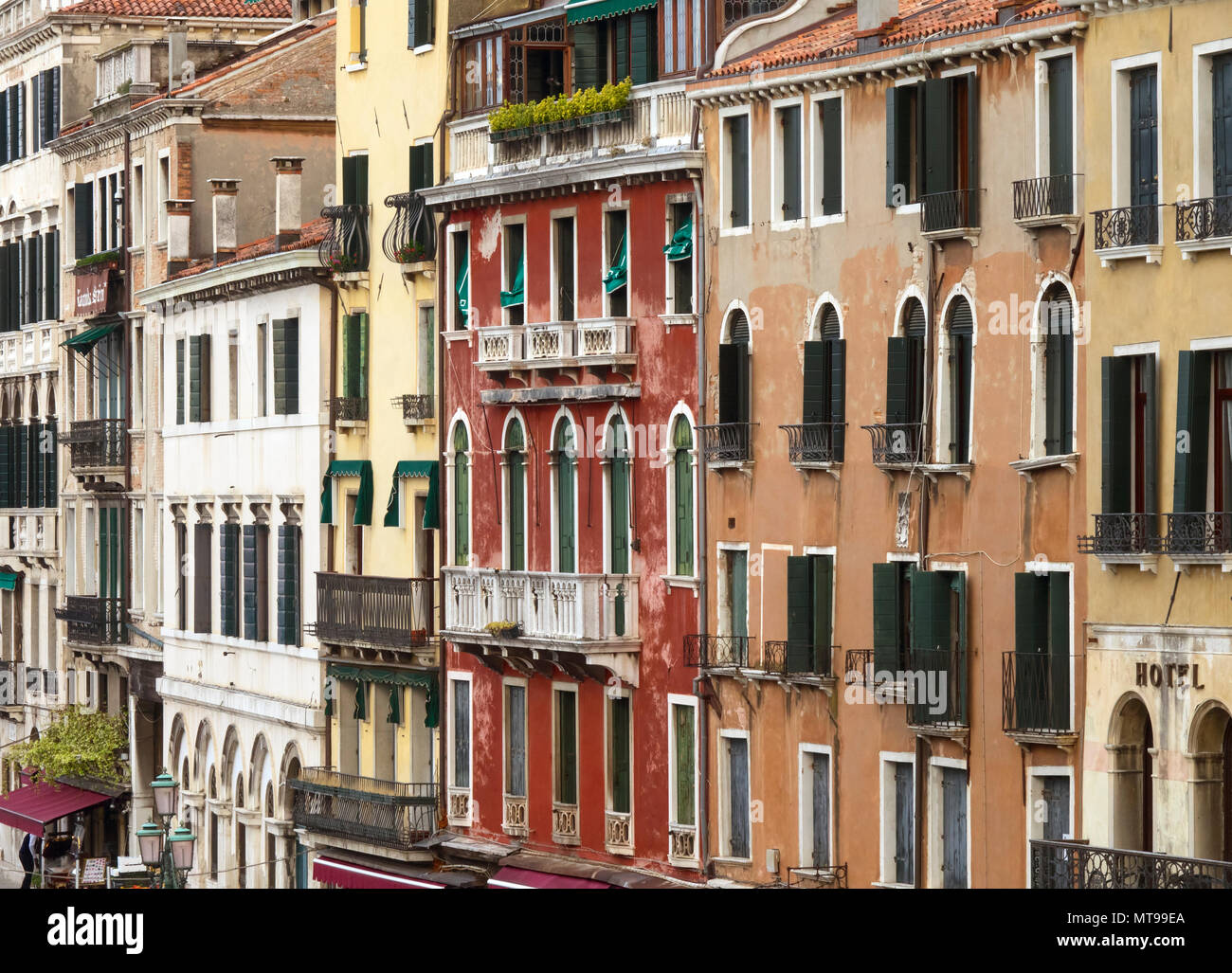 Multi-colored walls of houses in Venice Stock Photo - Alamy