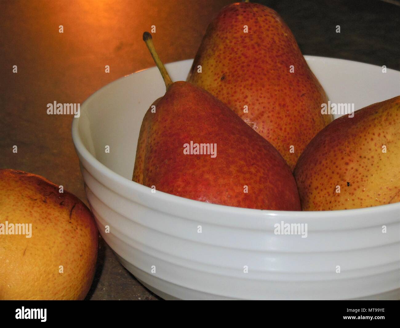 Pears in a white bowl Stock Photo