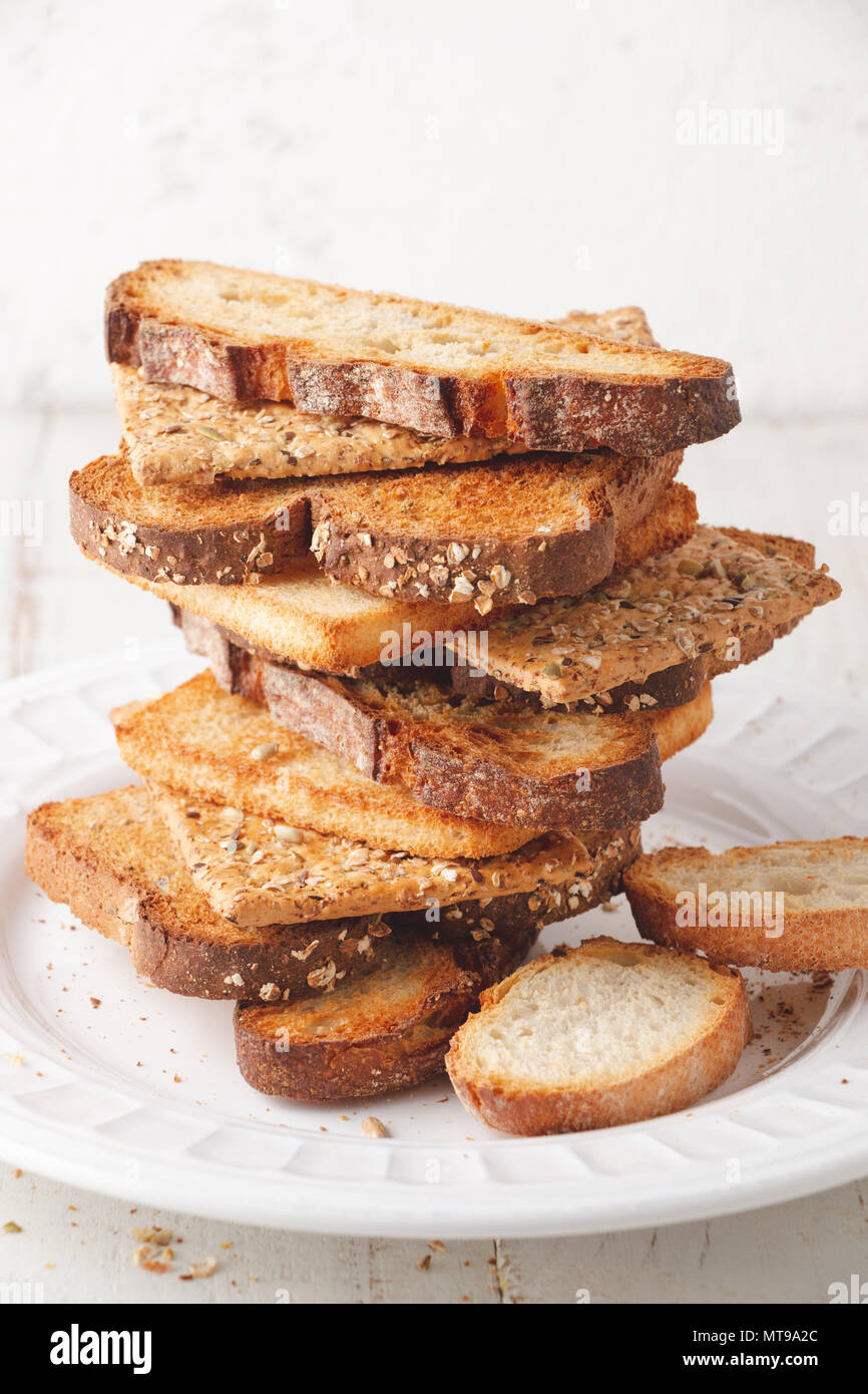 Assortment of toasts of different kinds of bread in a stack Stock Photo Alamy