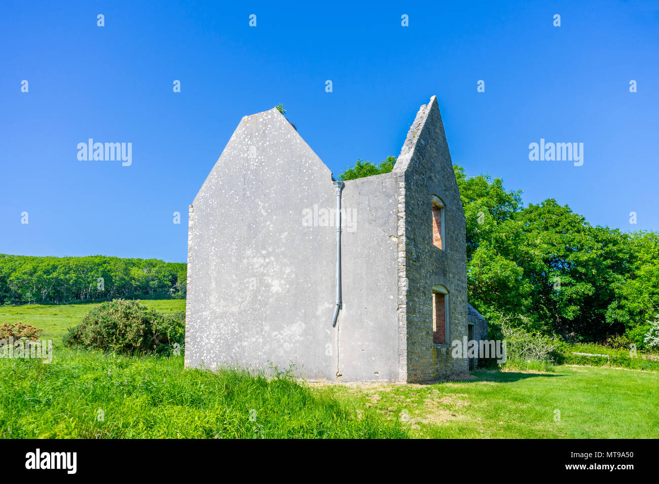 An abandoned house/ building in the ghost village of Tyneham in South Dorset located in the midst of the Lulworth Military Firing Range, England, UK Stock Photo