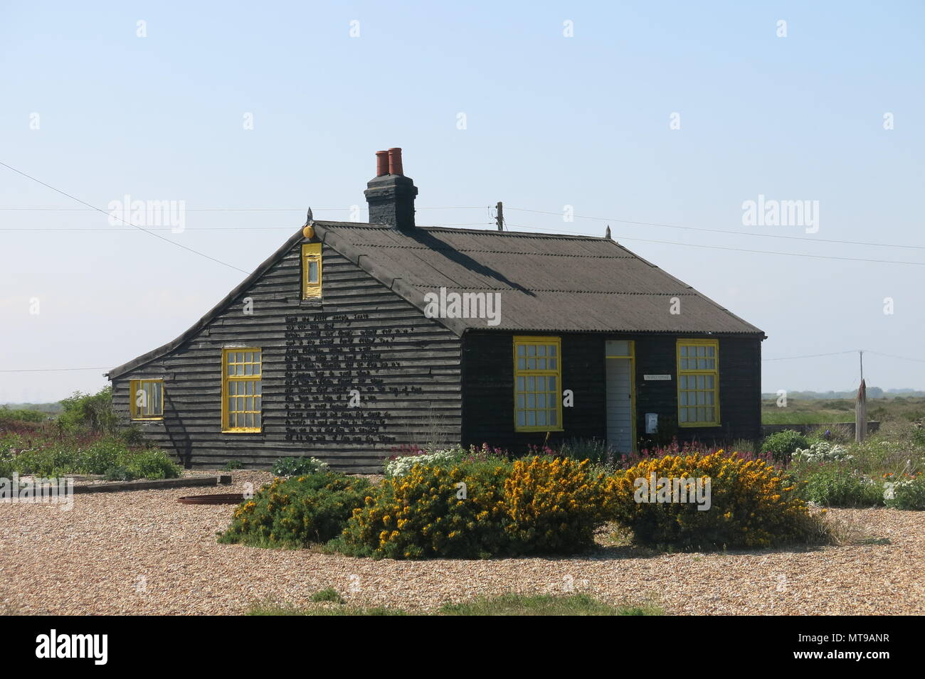 Prospect Cottage With Its Black Tar Varnish And Cheery Yellow