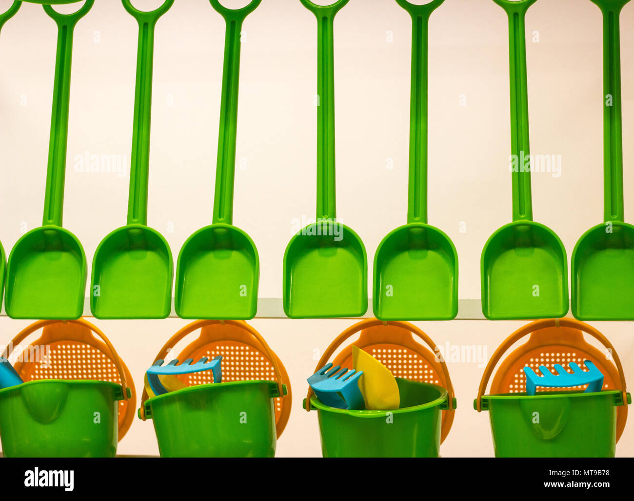 Several spades and buckets for playing children Stock Photo Alamy