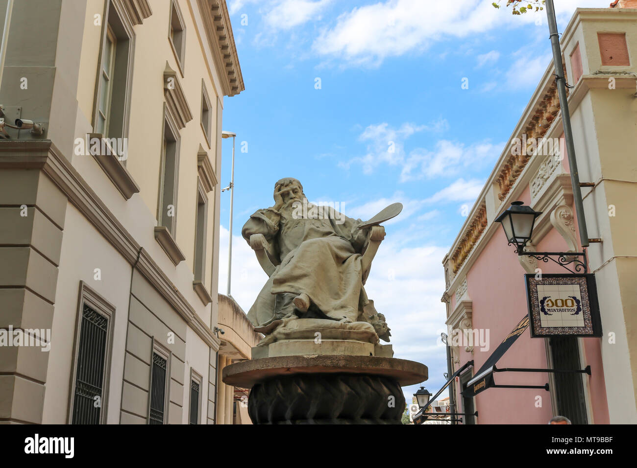 Statue of Jean-Louis Ernest Meissonier (a French artist), outside the Salvador Dali Theatre Museum in Figueres, Girona, Catelonia, Spain. Stock Photo