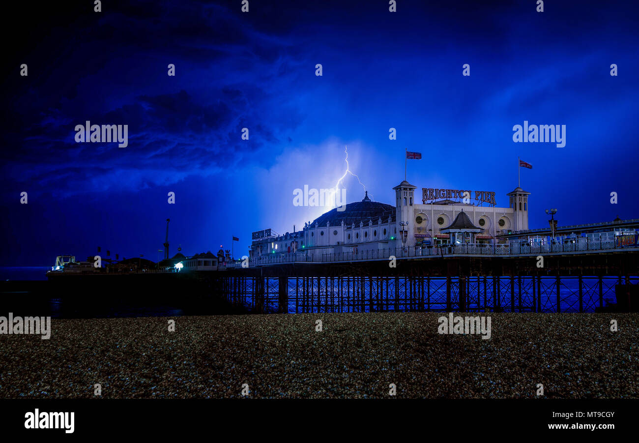Lightning across the sky over Brighton Palace Pier, Sussex, UK Stock
