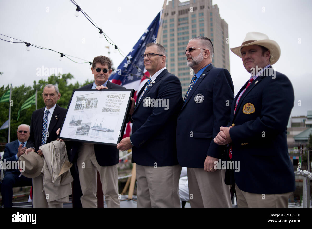Philadelphia, United States. 28th May, 2018. A presentation is made to the Society of the Honor Guard, Tomb of the Unknown Soldier during the Memorial Day ceremony onboard the retired USS Olympia, which carried home the remains of the Unknown Soldier interred at Arlington National Cemetery from France in 1921. Credit: Michael Candelori/Pacific Press/Alamy Live News Stock Photo
