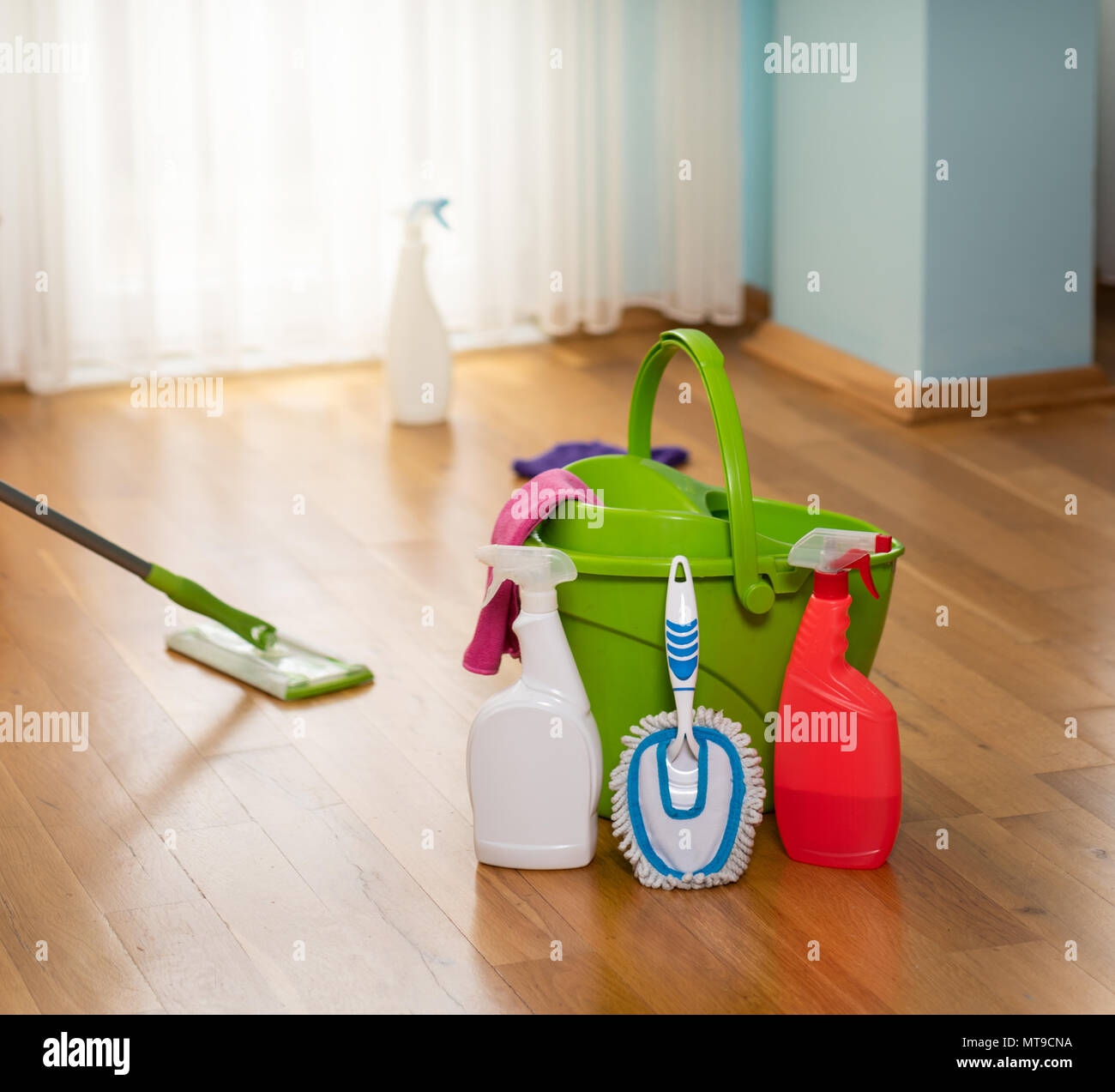 household cleaning materials, buckets, floor cloths, mops and chemical cleaning sprayers Stock Photo