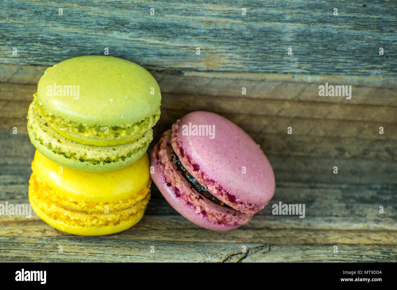 Colorful macaroons. macaroons on wooden table. Stock Photo