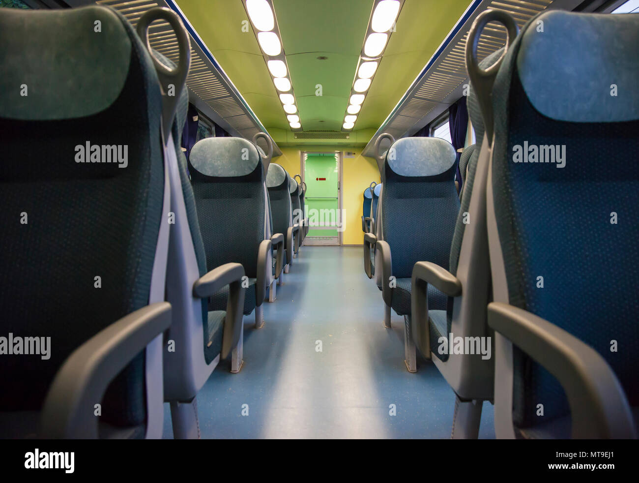 Blue and gray seats of an italian train Stock Photo