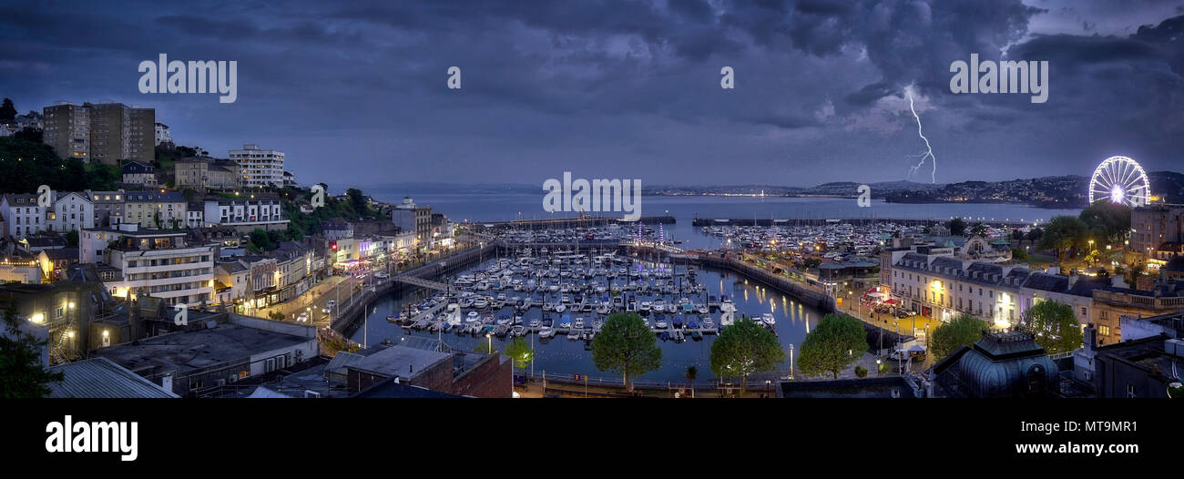 GB - DEVONSHIRE: Panoramic view of Torquay harbour and town by night Stock Photo