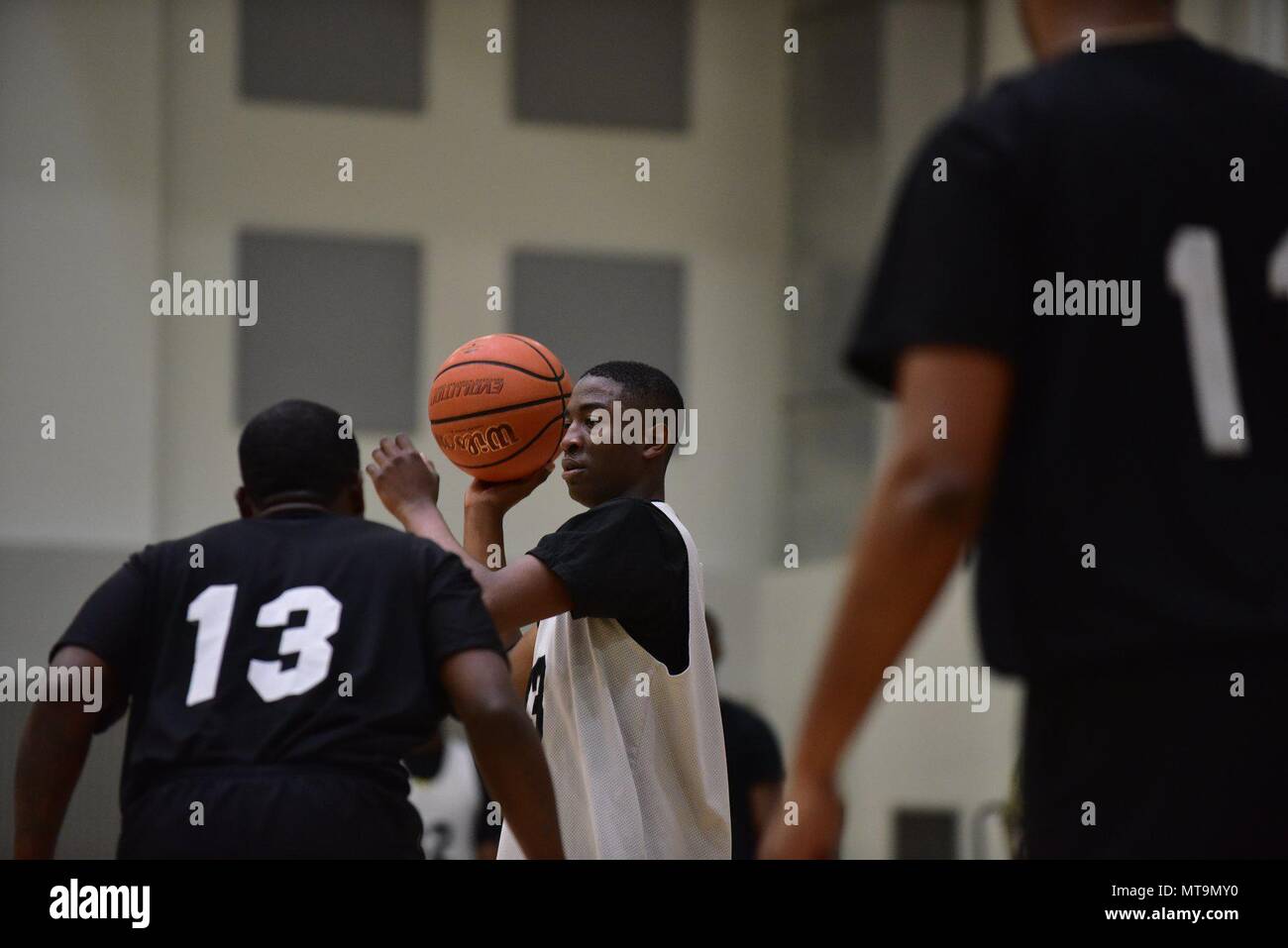 Pfc. Joquan Wright, a native of Garnett, South Carolina, Motor Transport Operator assigned to 210th Field Artillery Brigade, 2nd Infantry Division/ROK-U.S. Combined Division plays basketball during the 2018 KATUSA/U.S. Soldier Friendship Week at Camp Casey, May 18. Headquarters and Headquarters Battalion team won the basketball final against the 210th FA Bde. team. (U.S. Army Photo by Mr. Chin-U Pak, 2ID/RUCD Public Affairs) Stock Photo