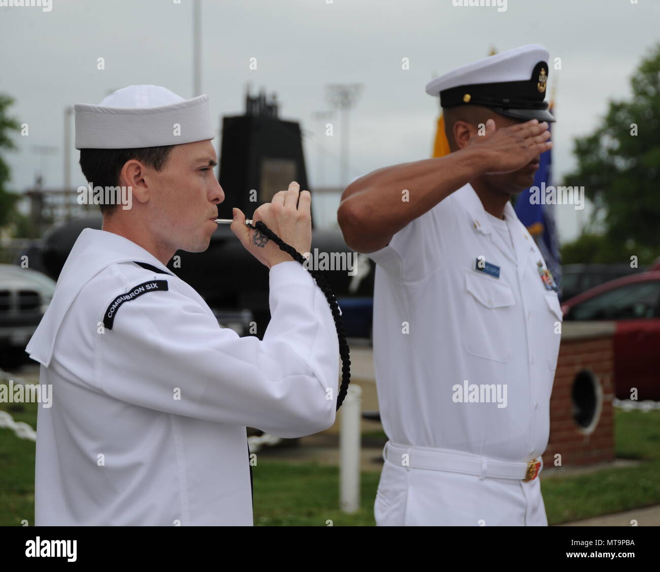 Boatswain’s Mate Second Class Brandon Nobles, assigned to Submarine Squadron Six, pipes the