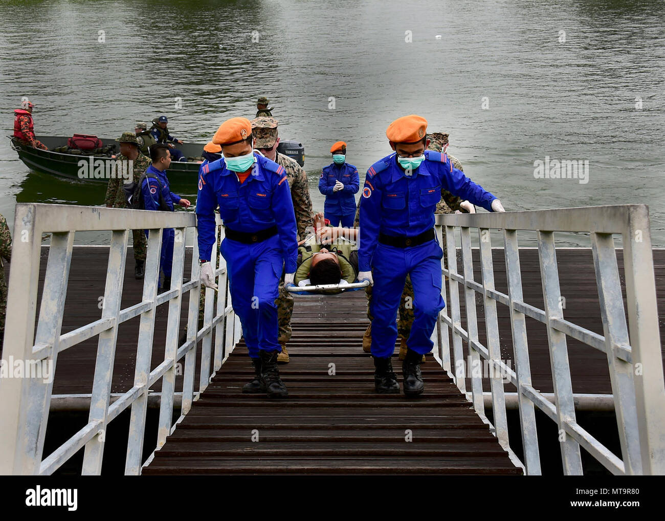 Kuching Malaysia April 18 2017 Malaysian Civil Defense Personnel Cary A Simulated Casualty From Shoreline To Awaiting Medical Personnel While Participating In A Field Training Exercise Ftx During Pacific Partnership 2017 Kuching