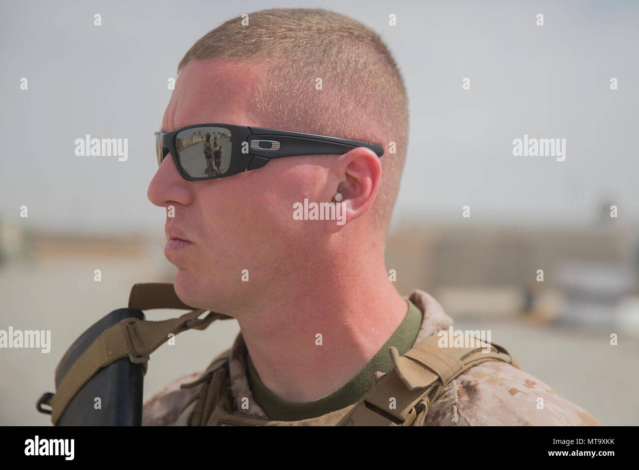 A U.S. Marine with Task Force Southwest (TFSW) waits to board a ...