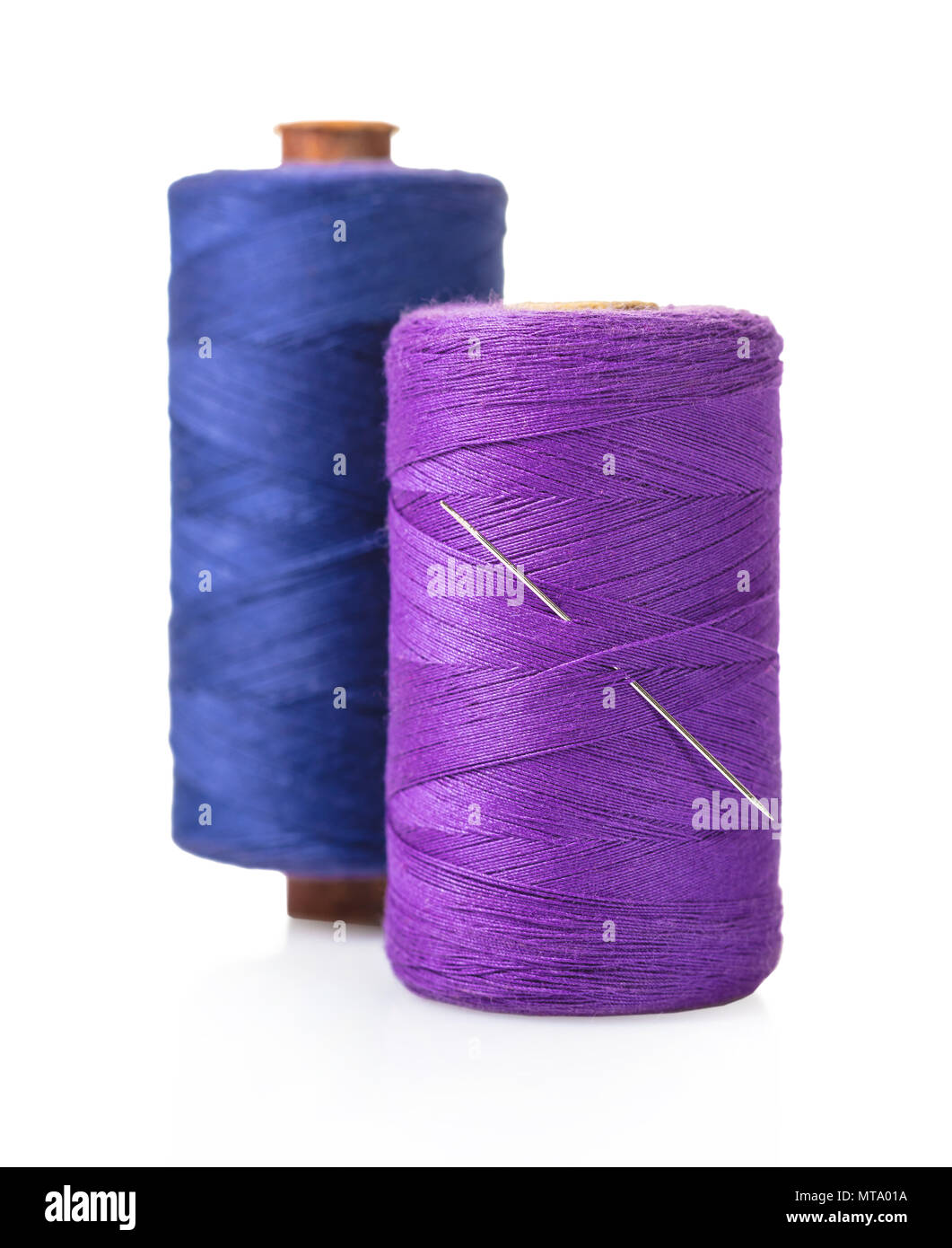 spool of thread with a needle on white isolated background Stock Photo ...