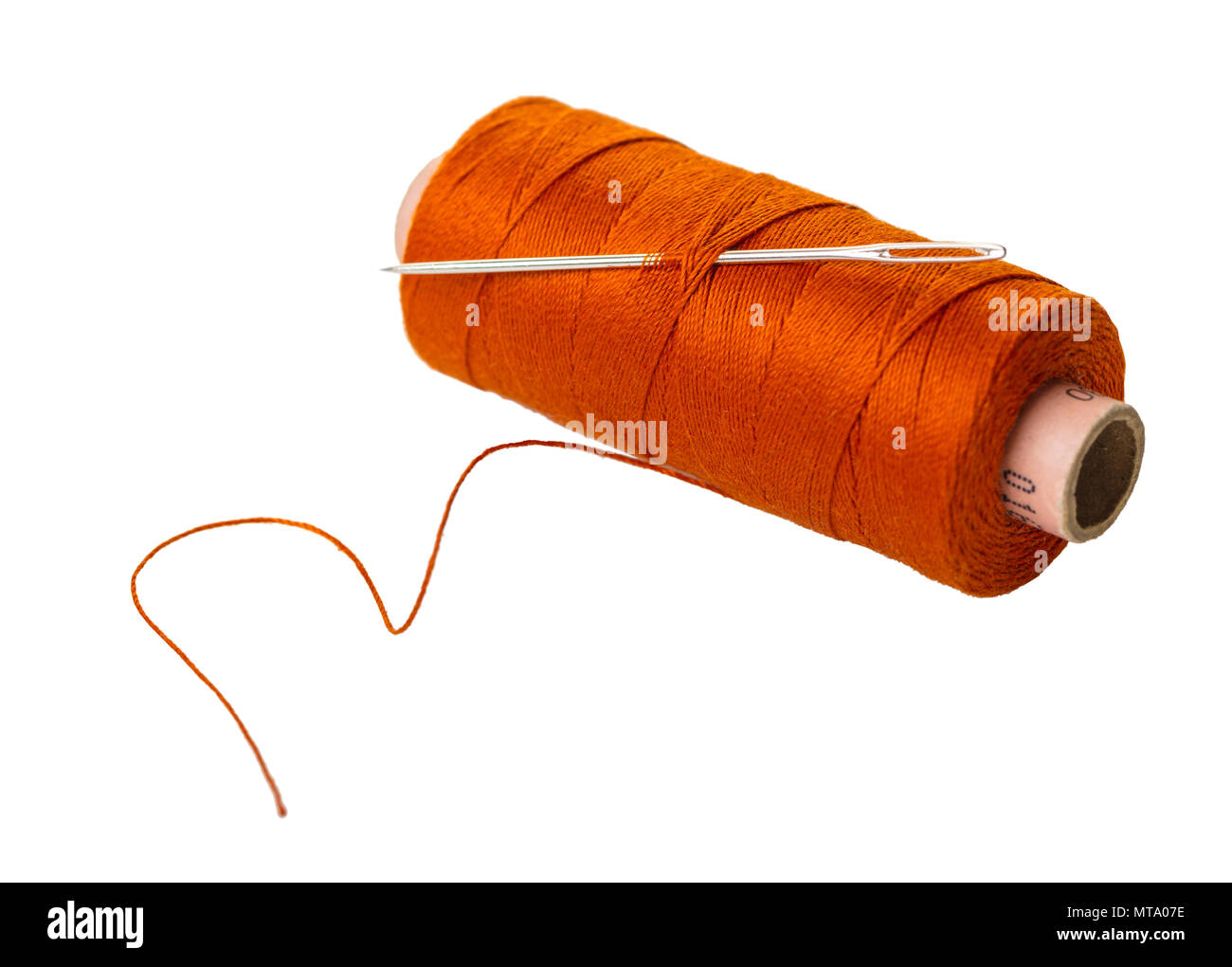 spool of thread with a needle on white isolated background Stock Photo ...