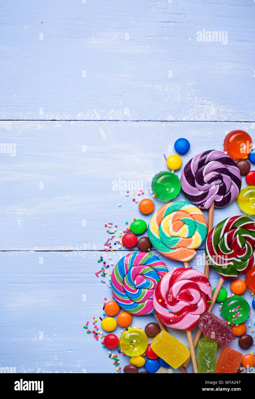 Assortment of colorful candies and lollipops. Sweet background Stock ...