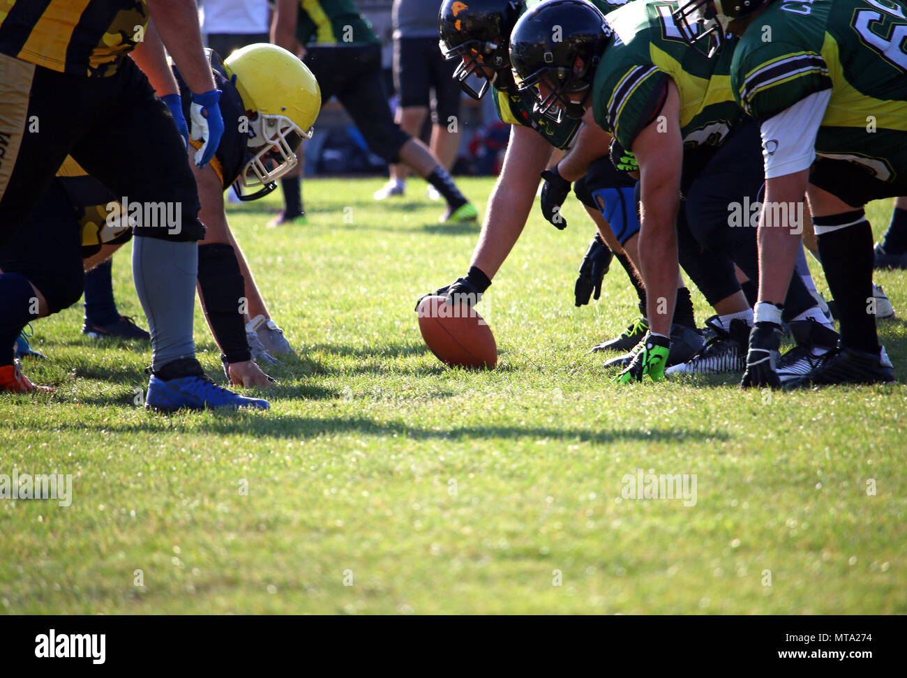 American football players on the scrimmage line sport Stock Photo