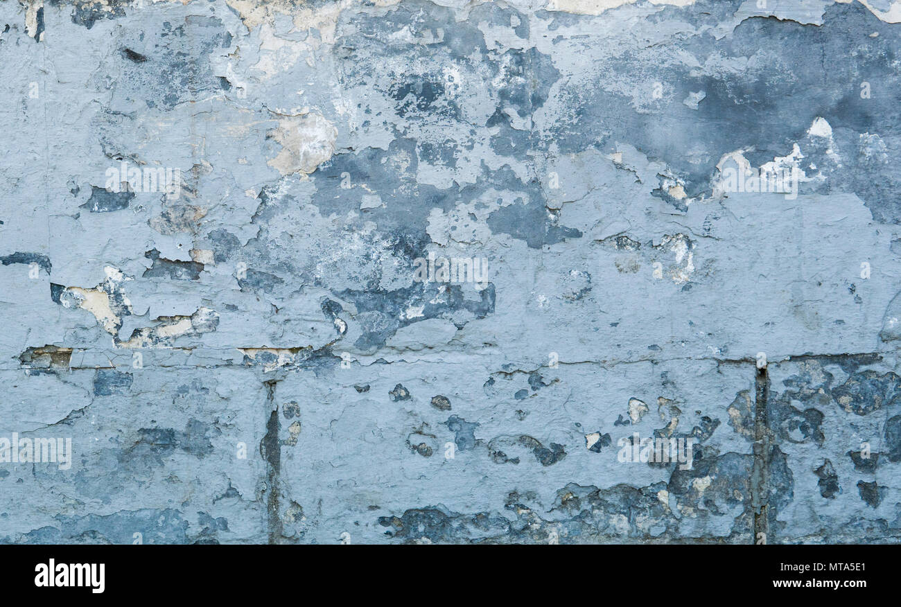 blue concrete wall grunge texture with cracks cracks scrapes old paint