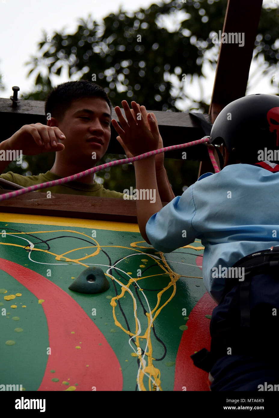 KUCHING, Malaysia (April 20, 2017) A U.S. Marine congratulates a Scout