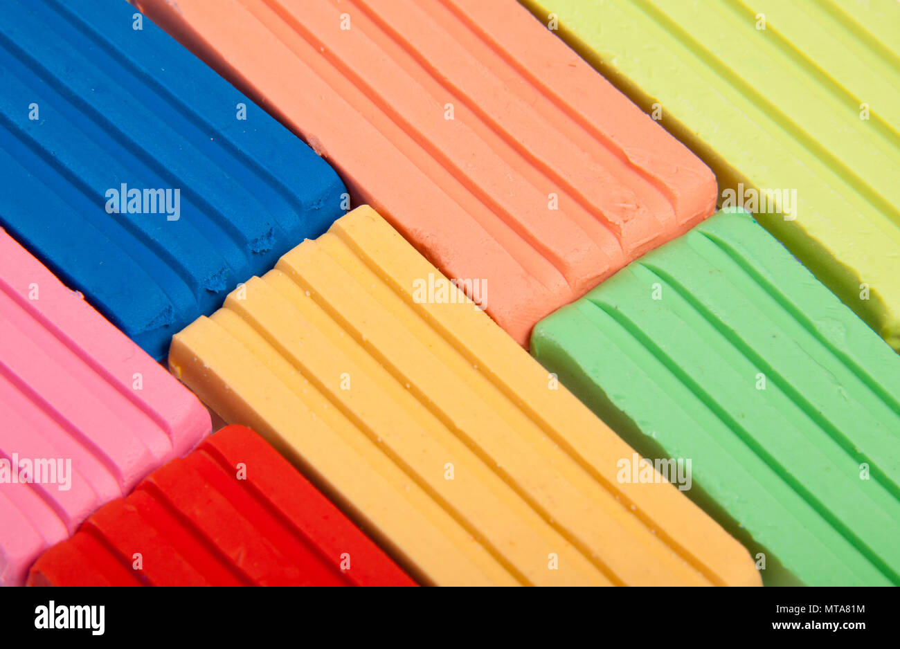 Multi-colored children's plasticine, background. Close up Stock Photo