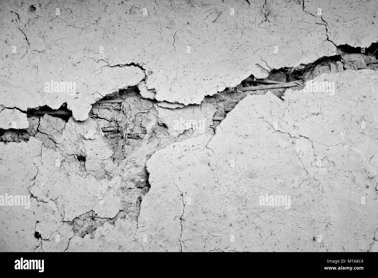 Grunge concrete cement wall with crack in industrial building Stock