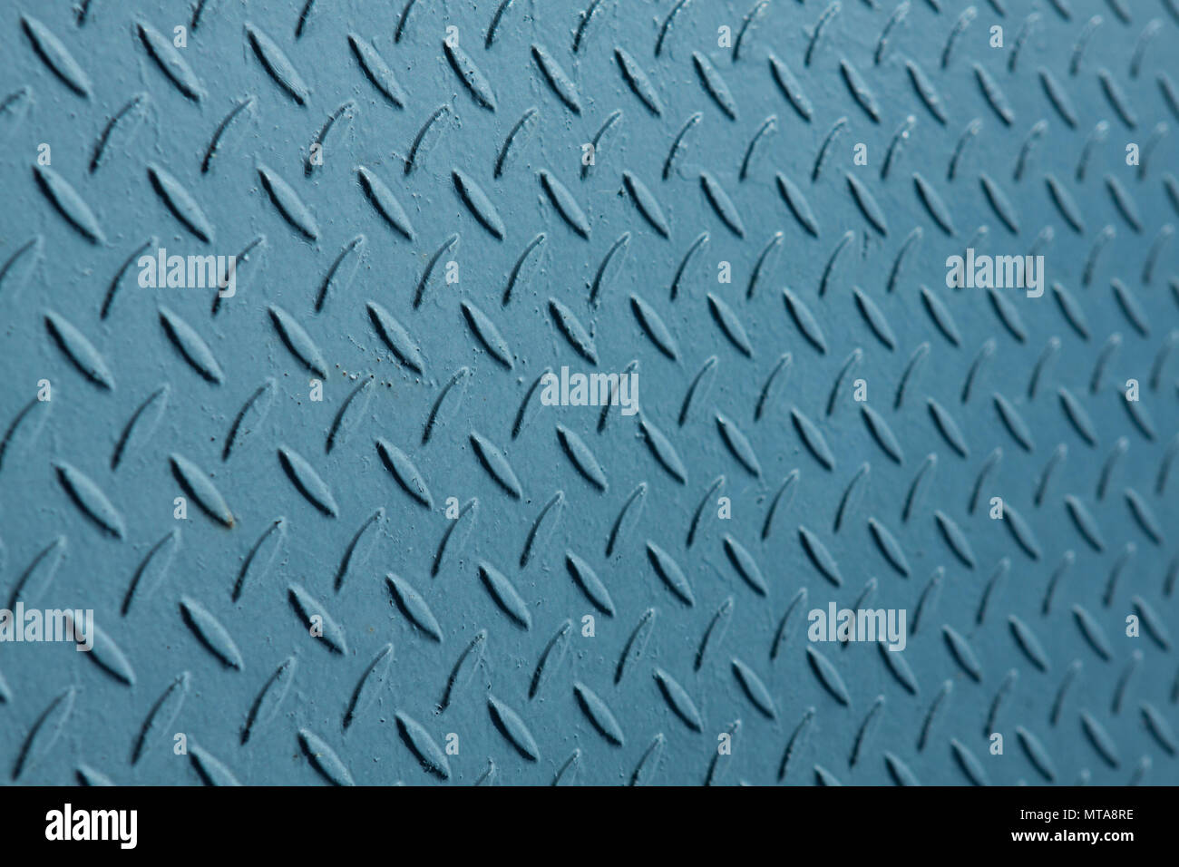 Stainless steel and aluminum light blue background Stock Photo - Alamy