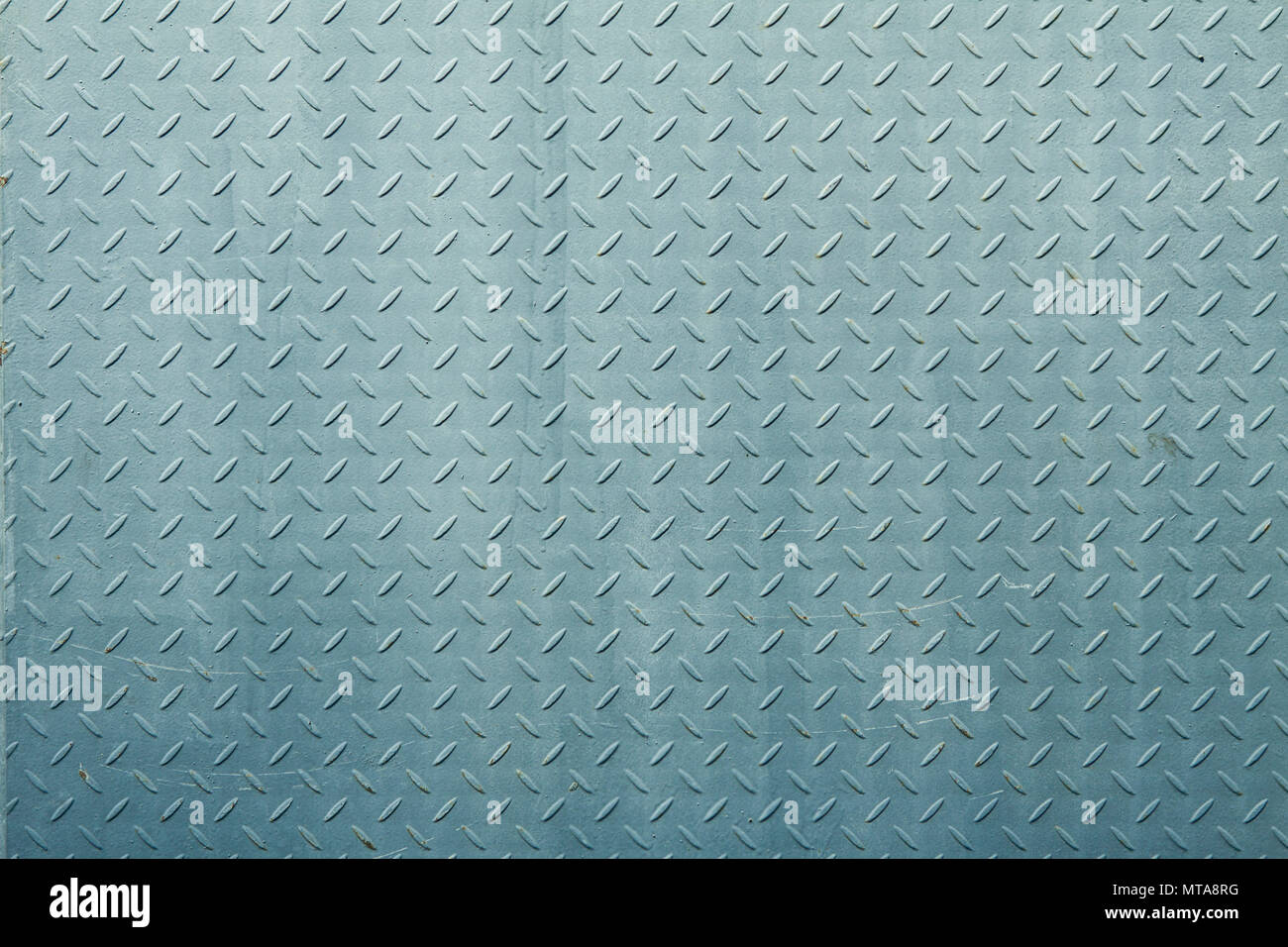 Stainless steel and aluminum light blue background Stock Photo - Alamy