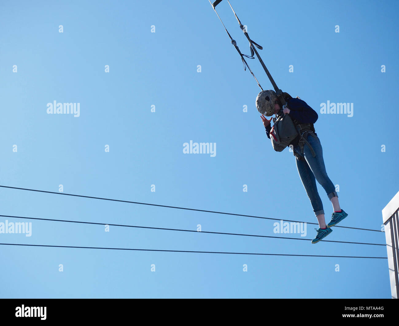 Eagle River High School Air Force Junior Rotc Cadet Riley Sheldon Rides A Zip Line After Exiting A 34 Foot Jump Tower April 19 17 At The Joint Base Elmendorf Richardson Airborne Sustainment Training Eagle River High School Air Force Junior Rotc Cadet Riley Sheldon Rides A Zip Line After Exiting A 34 Foot Jump Tower April 19 17 At The Joint Base Elmendorf Richardson Airborne Sustainment Training