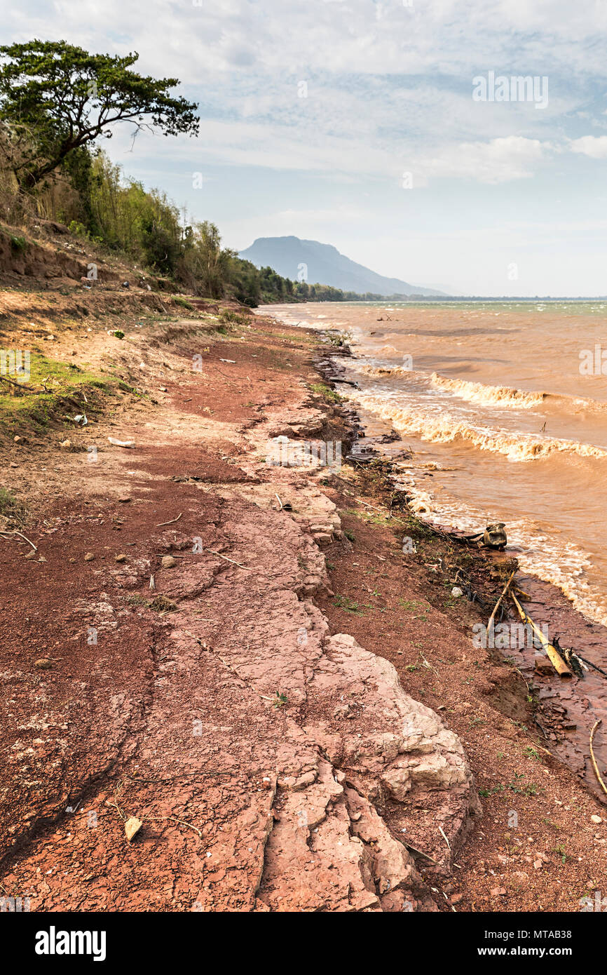 Eroding river bank, Mekong River on the bamboo trail at Vat Muang Kang, Laos Stock Photo