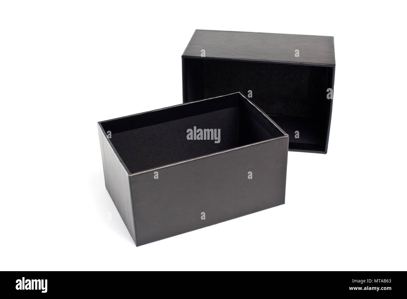 Opened black cardboard box for packaging on a white background Stock Photo