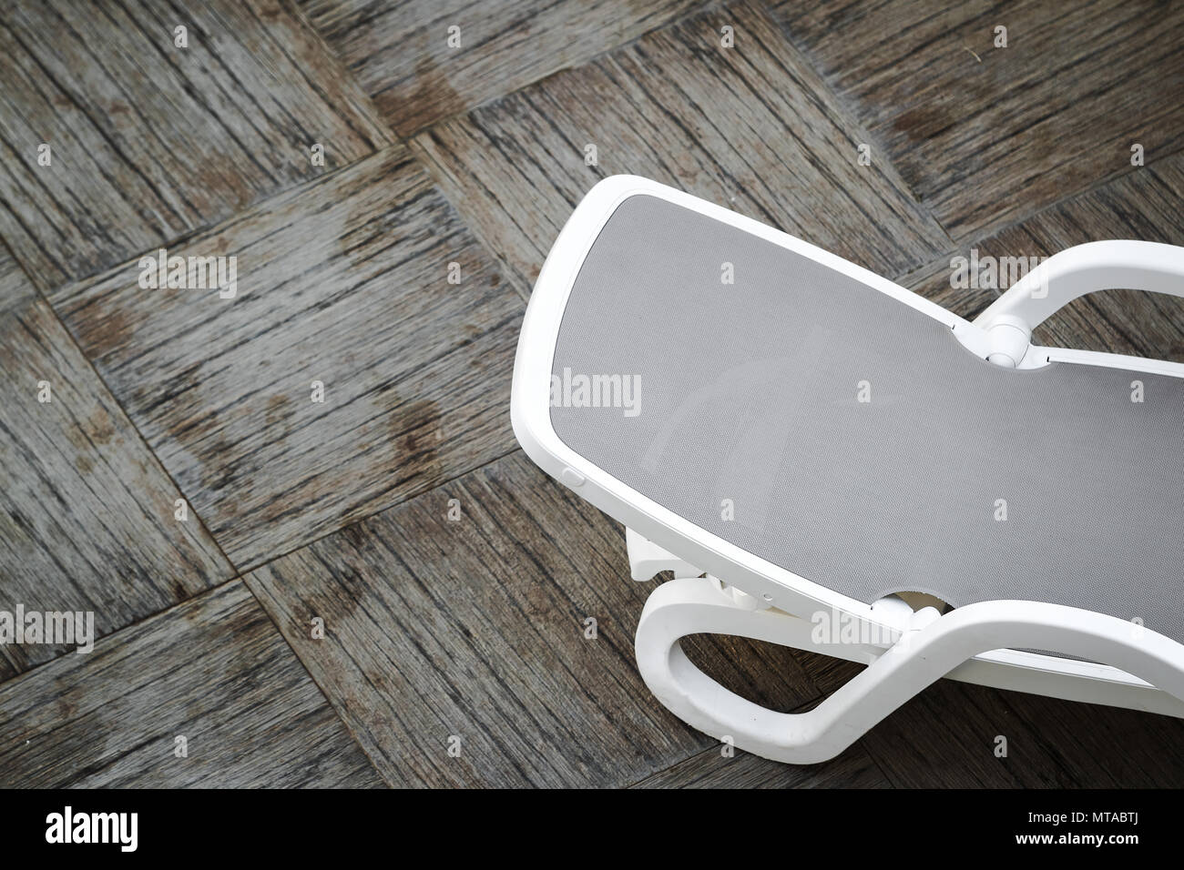 deck chair near the swimming pool Stock Photo Alamy