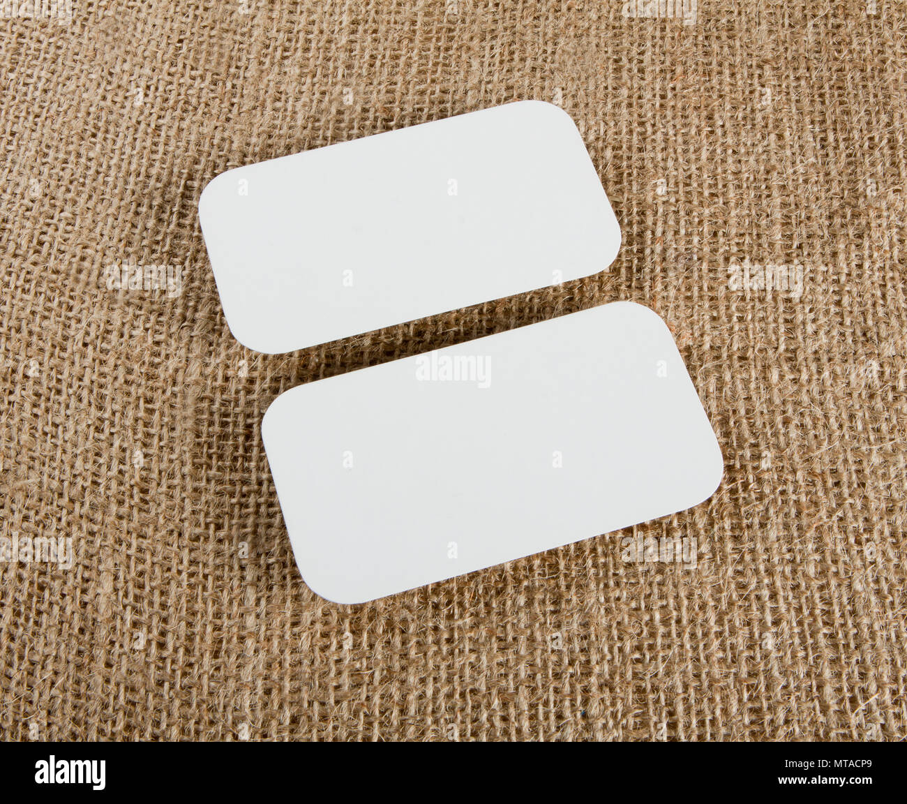 identity design, corporate templates, company style, blank business cards  with rounded corners on burlap Stock Photo - Alamy