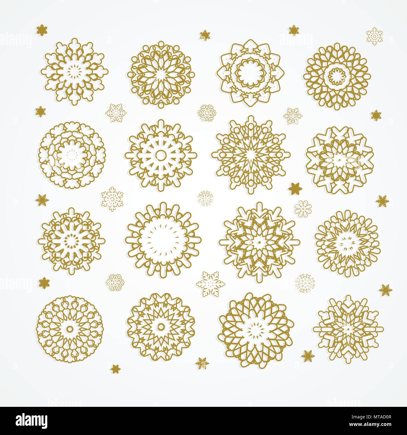 Collection of golden snowflakes on a white background, vector ...