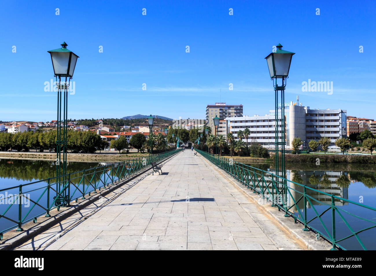 View of the pedestrian bridge over the Tua River in Mirandela, Tras os Montes, Portugal Stock Photo