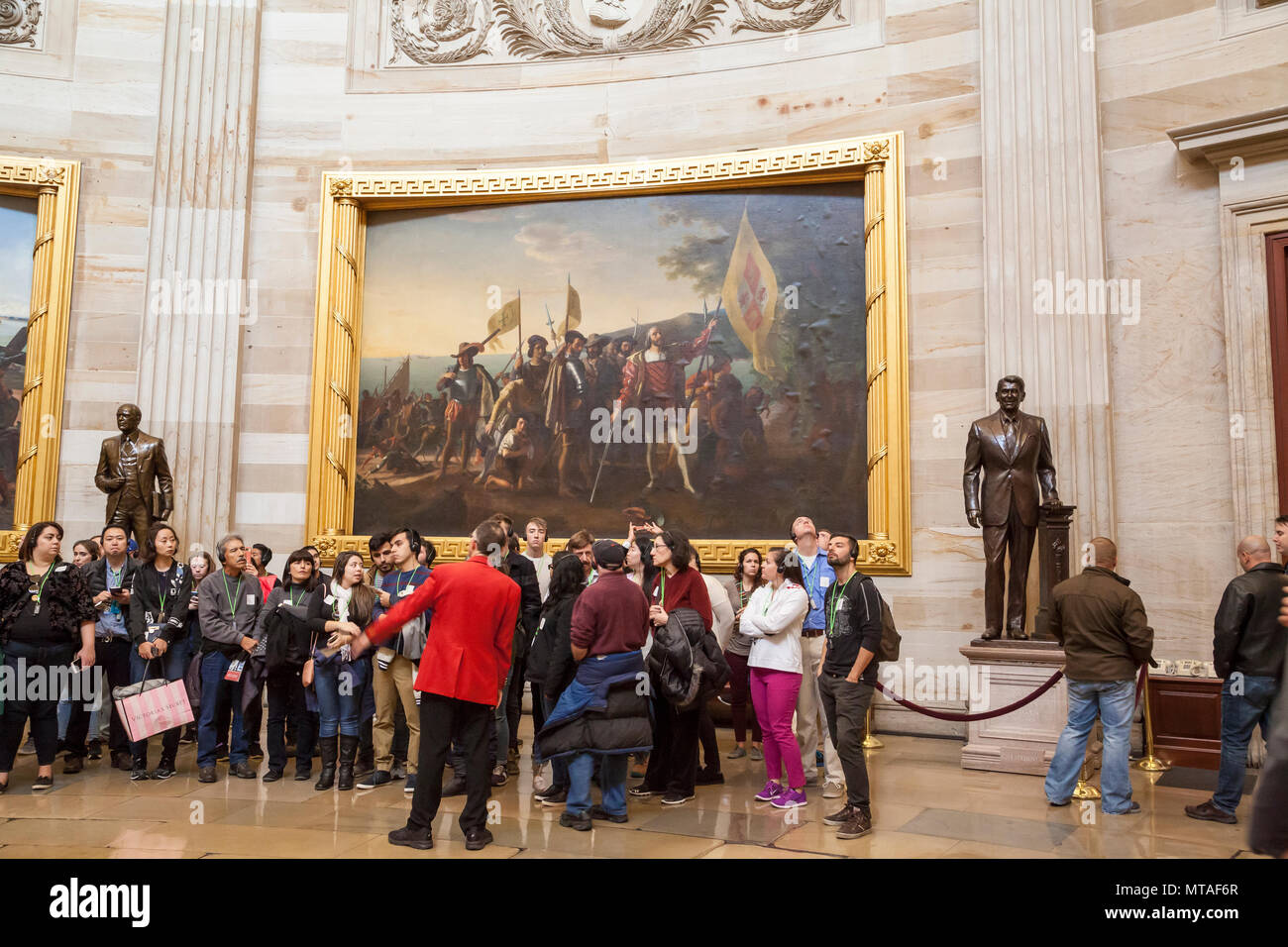 Tour guide assisting tourists in the Capitol Hill rotunda, Washington DC, USA Stock Photo