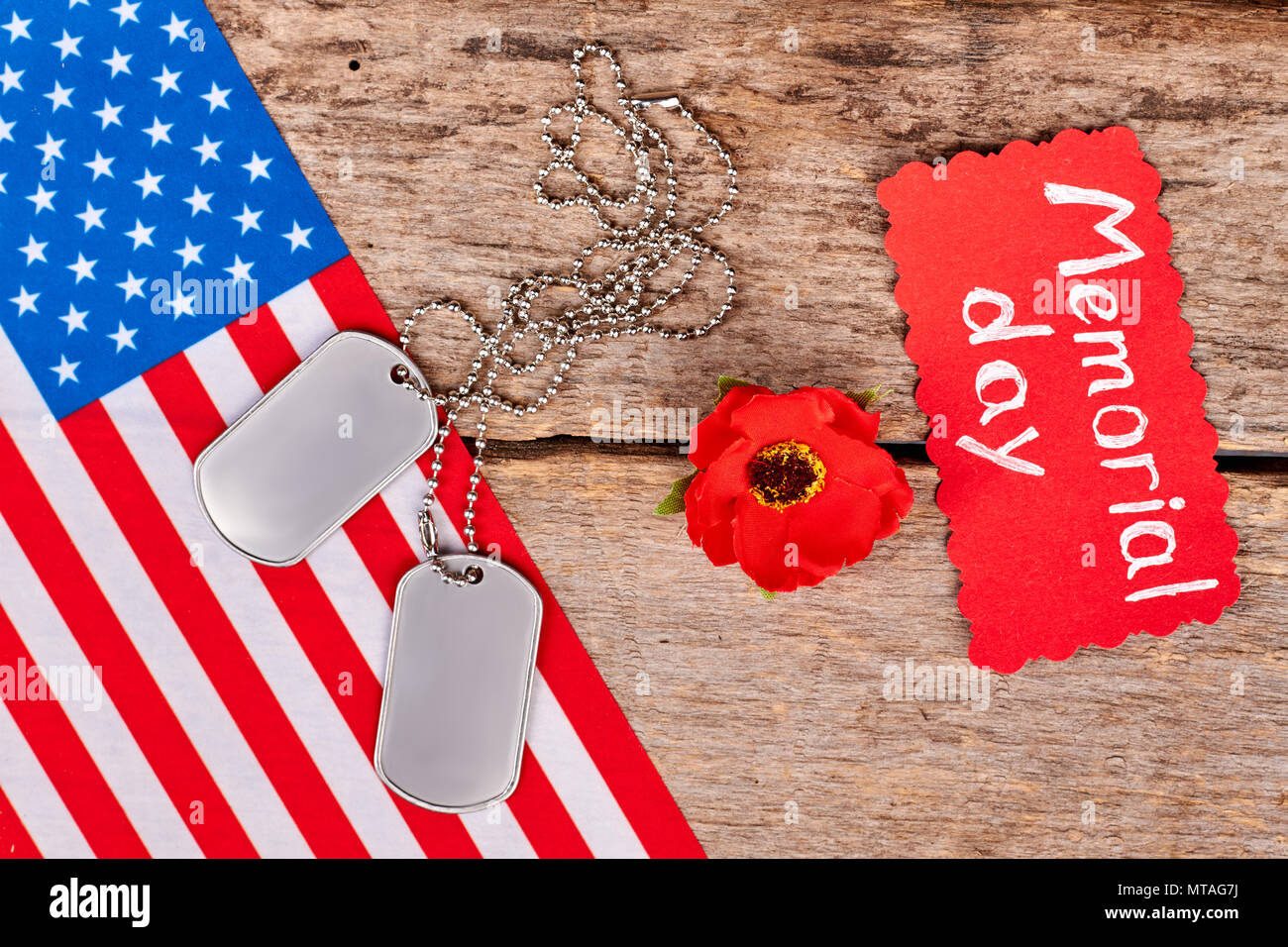 Dog tags and red poppy flower. US memorial day concept Stock Photo - Alamy