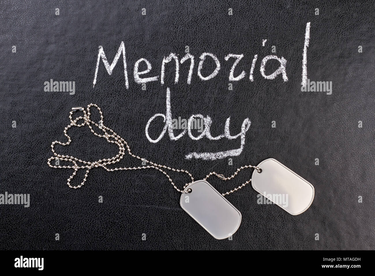 Memorial day concept, dog tags. Black leather background. Stock Photo