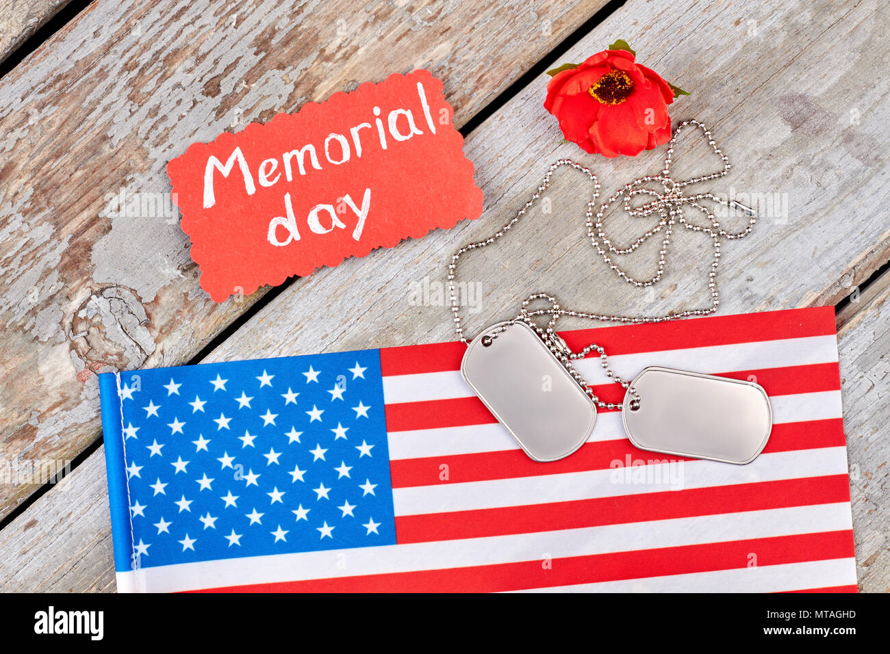 Symbols of memorial day. Flag of united states, dog tags, and red poppy