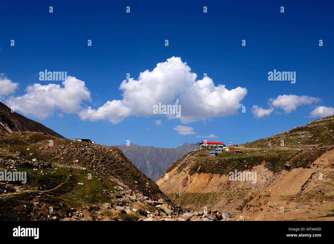Rest house with red roof on mountain top at Lake Saiful Muluk Kaghan Valley Pakistan Stock Photo