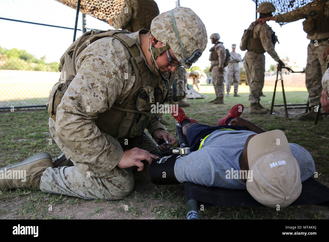 A role player seeks medical attention during Assault Support Tactics ...
